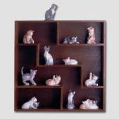 12 cat figurines produced by Royal Copenhagen