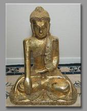 Buddha figurine sidding
