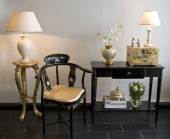 Chinese chair, black laquer with decoration, with cushion