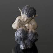 Faun playing flute, Royal Copenhagen figurine