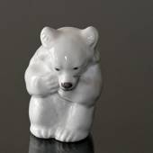 White Polar bear cub sitting timidly figurine, Royal Copenhagen no. 21435