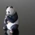 Panda eating bamboo looking content, Royal Copenhagen figurine | No. 1020662 | Alt. 1020662 | DPH Trading