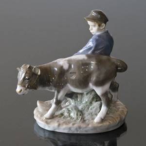 Boy walking to the field with Calf, Royal Copenhagen figurine no. 772 | No. 1021074 | Alt. R772 | DPH Trading