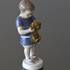 Boy holding a dog in front of him, Ole. Bing & Grondahl figurine no. 1747 | No. 1021422 | Alt. B1747 | DPH Trading