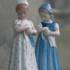 Mary Girl holding her doll lovingly, Bing & Grondahl figurine nr 1721 | No. 1021561 | Alt. B1721 | DPH Trading