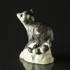 Racoon on Rock looking up, Royal Copenhagen figurine | No. 1249057 | Alt. 1249057 | DPH Trading