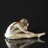 Sitting ballerina bending forward, Royal Copenhagen figurine | No. 1249329 | DPH Trading