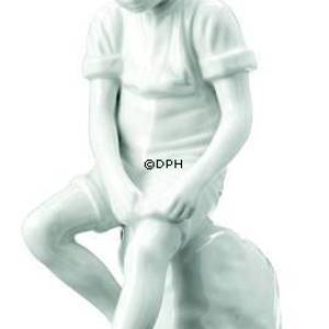 Boy sitting on stone, Royal Copenhagen figurine | No. 2670520 | DPH Trading