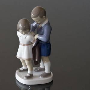 Gentleman, Boy helping girl with coat, Bing & Grondahl child figurine No. 2312 | No. B2312 | DPH Trading