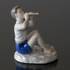 Fluteplayer, sitting boy learning the notes, Bing & Grondahl figurine No. 2344 | No. B2344 | DPH Trading