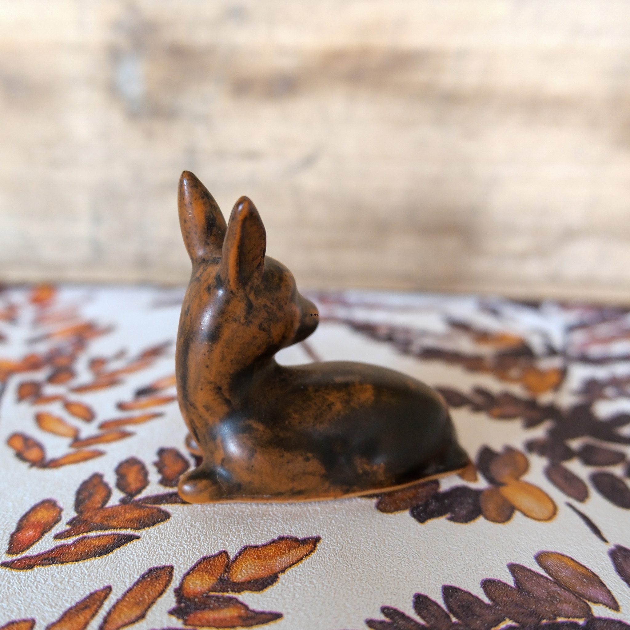 Johgus ceramic fawn lying down