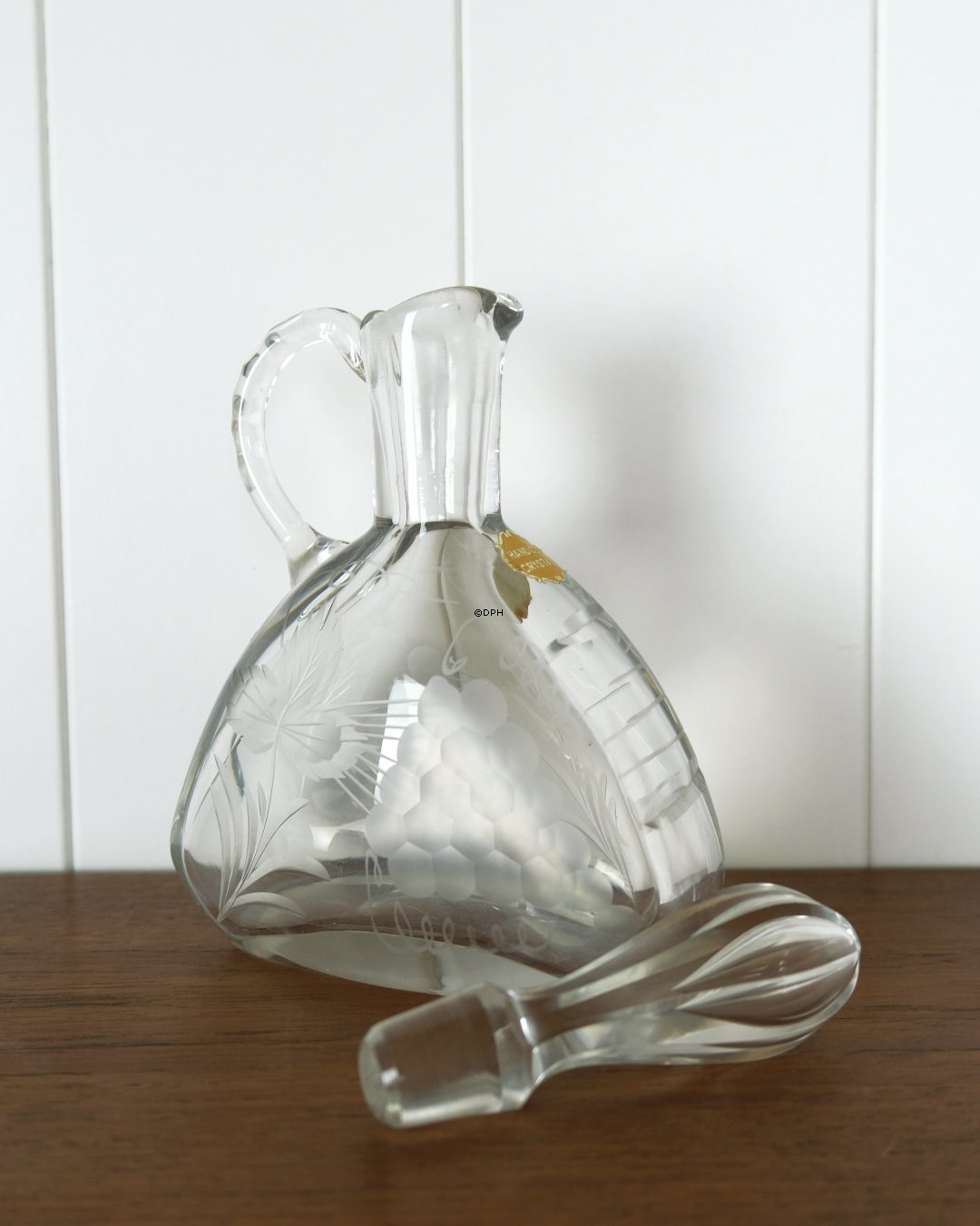 Crystal carafe with hand-cut grape motif