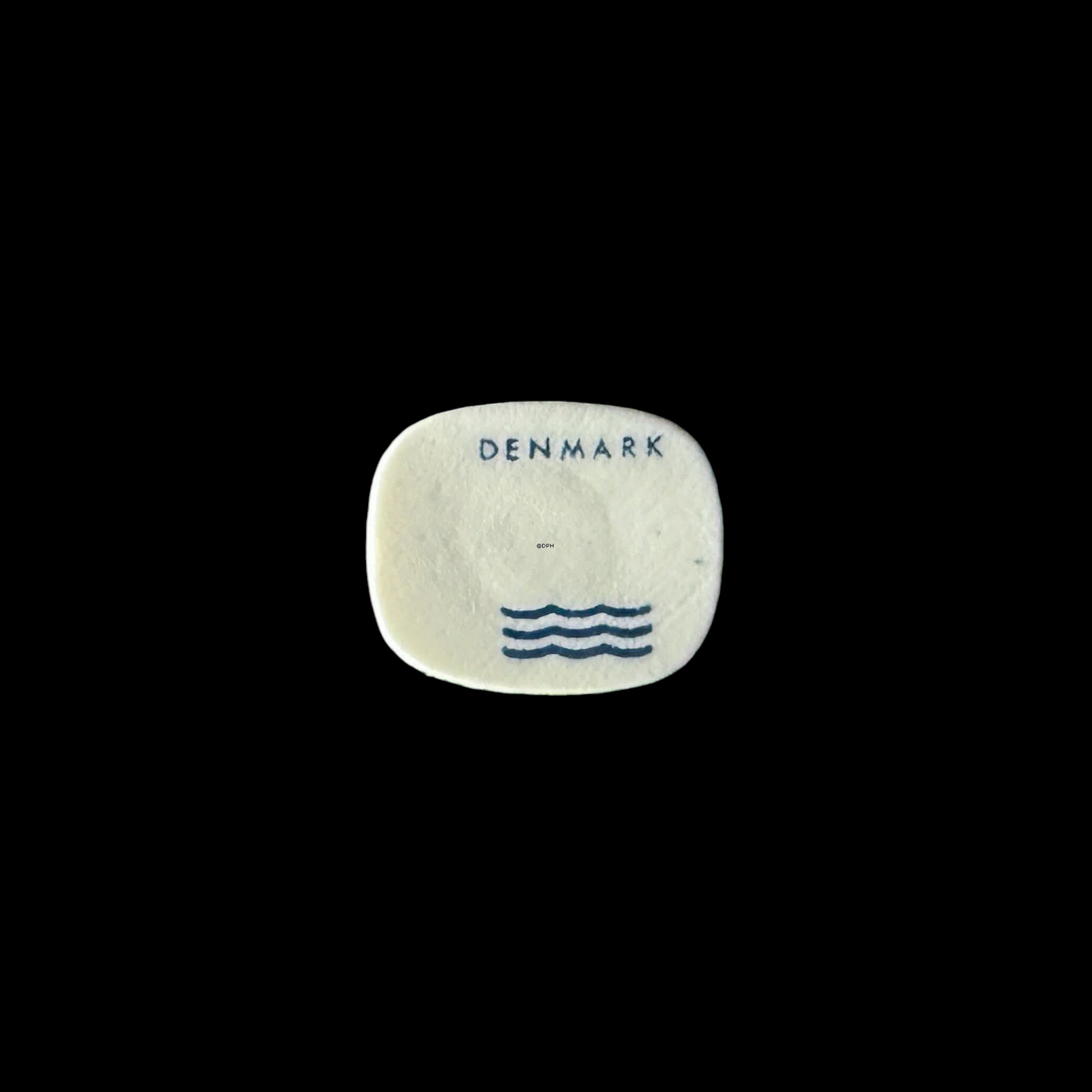 Royal Copenhagen porcelain cabochon with a lion motif