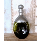 Triangular decanter in green glass with pewter coating