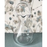 Glass decanter with pouring spout and solid handle