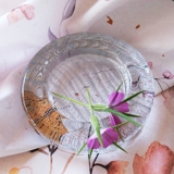 Glass bowl with ribbed pattern at the bottom, solid glass