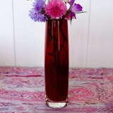 Glass vase in bordeaux colored glass