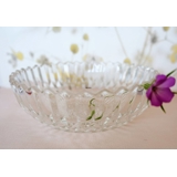 Glass bowl with flower and serrated edges