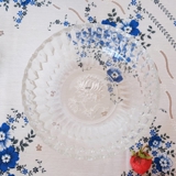 Glass bowl with flower and serrated edges