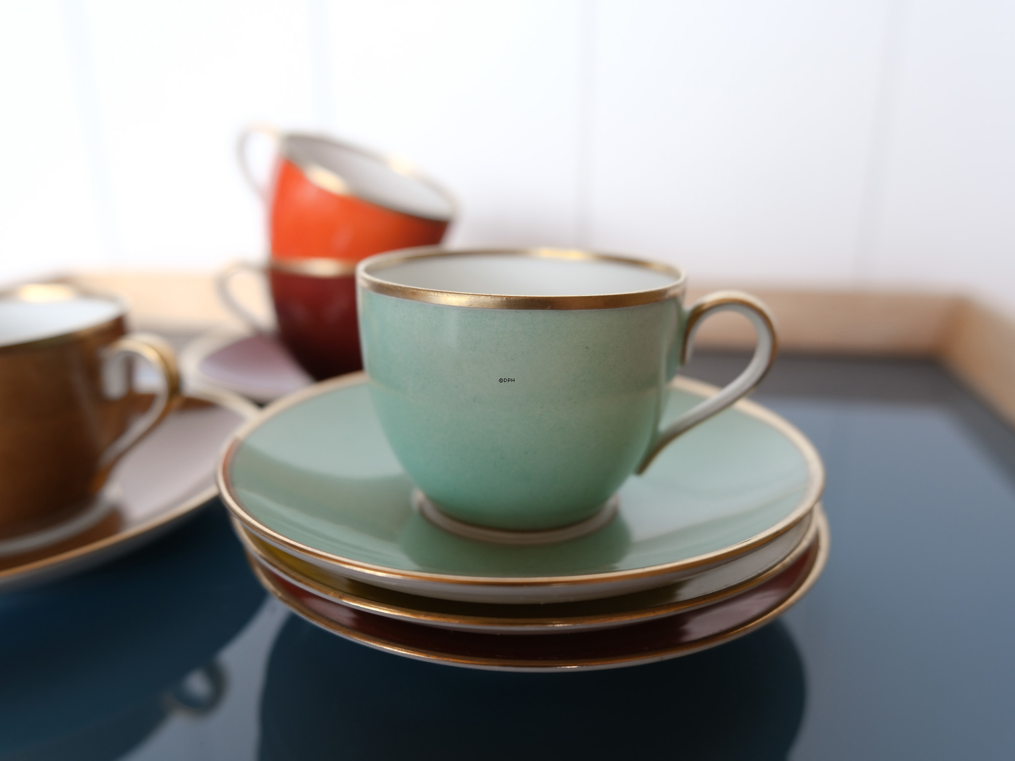 Express cups (mocca) with saucers, Bing & Groendahl set of 6 pcs in matching colours.