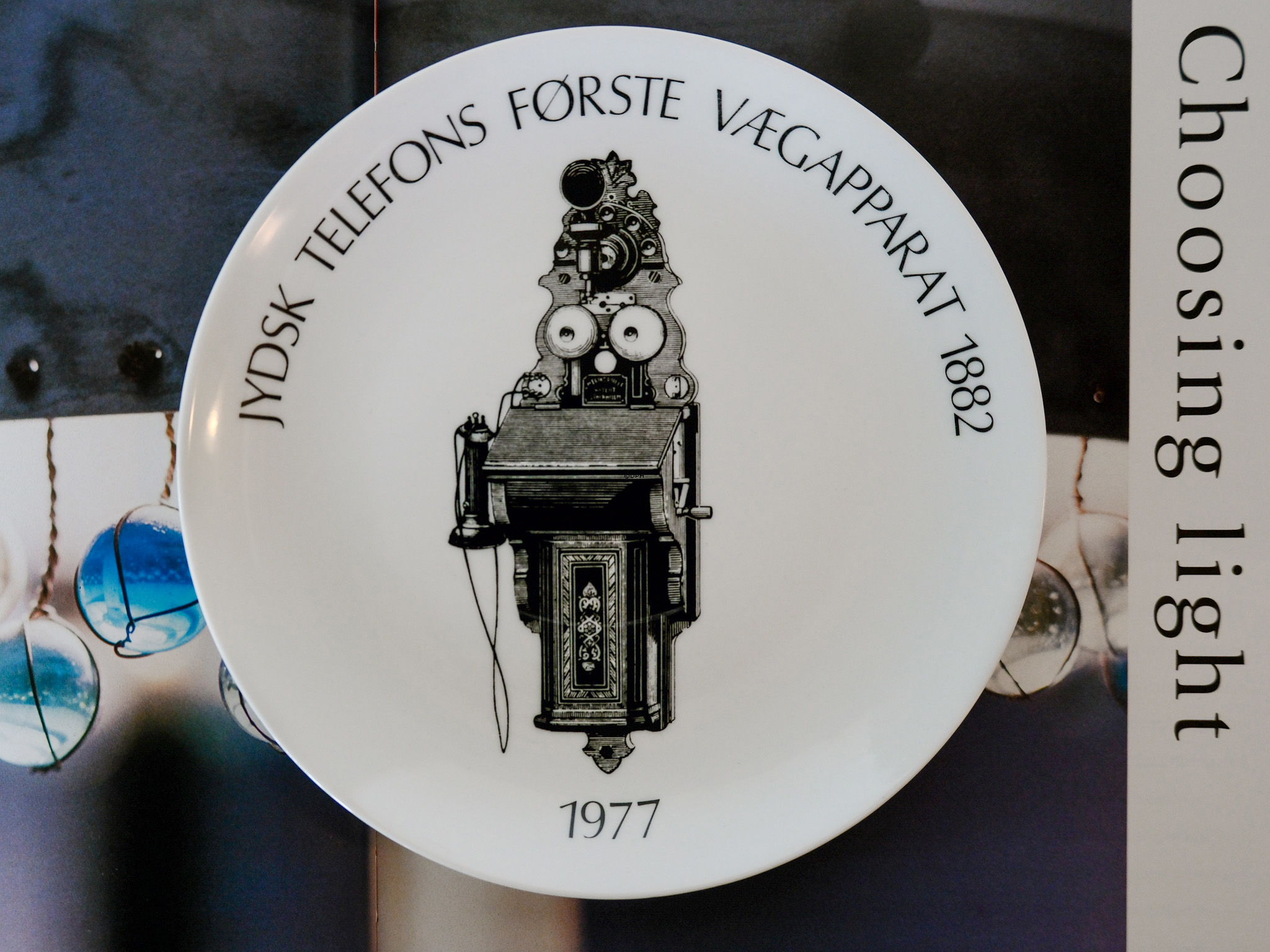 Telephone plates with various motifs, complete set of 18 pieces.
