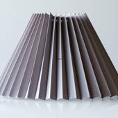Pleated lamp shade of grey chintz fabric, sidelength 21cm