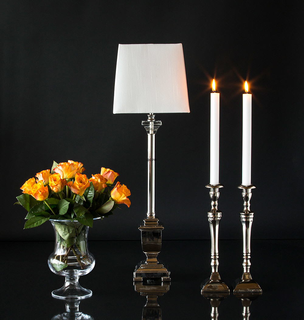 Lamp in silver with bright lampshade