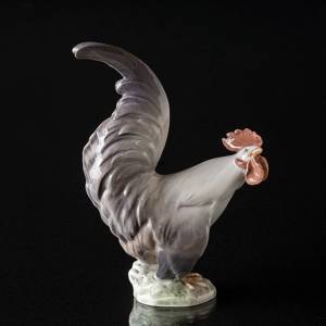 Rooster looking for the sun, Royal Copenhagen bird figurine No. 1025 | No. R1025 | DPH Trading
