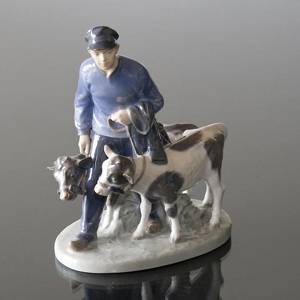 Boy with 2 calves, Royal Copenhagen figurine no. 1020117 | No. R1858 | Alt. 1020117 | DPH Trading