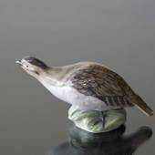 Partridge curving its neck, Royal Copenhagen bird figurine No. 2261
