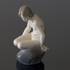 Girl on stone looking down, Royal Copenhagen figurine No. 4027 | No. R4027 | DPH Trading