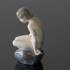 Girl on stone looking down, Royal Copenhagen figurine No. 4027 | No. R4027 | DPH Trading