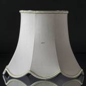 Octagonal lampshade with curves height 20 cm covered with off white silk fa...
