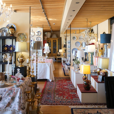 Large store space at the Danish Porcelain House in Odense, Denmark, filled with lamps, candleholders, porcelain, and home décor – an extensive and varied selection.