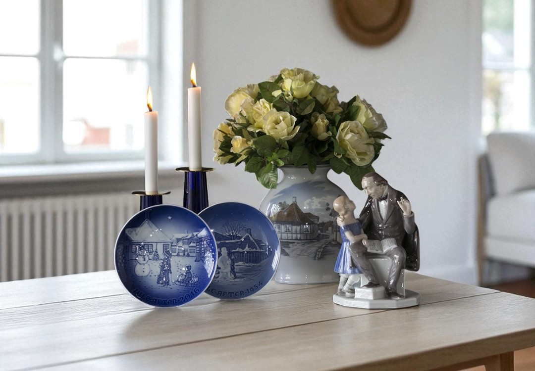 Bing & Groendahl Christmas plates displayed with home decor featuring H. C. Andersen inspired motifs