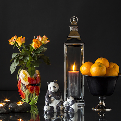 Figures of pandas with beautiful flowered vase, lantern and fruit bowl
