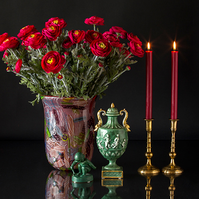 Glass art vase with green figure and vase together with two candlesticks