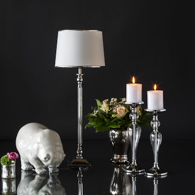 Large polar bear figure with lamp, candlesticks and plant pot