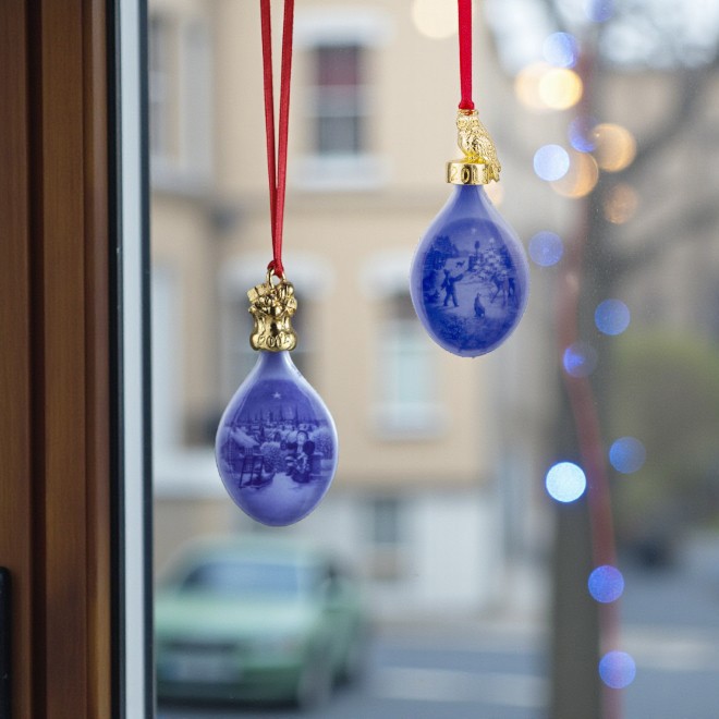 Bing & Groendahl drops, Christmas ornaments in the window.