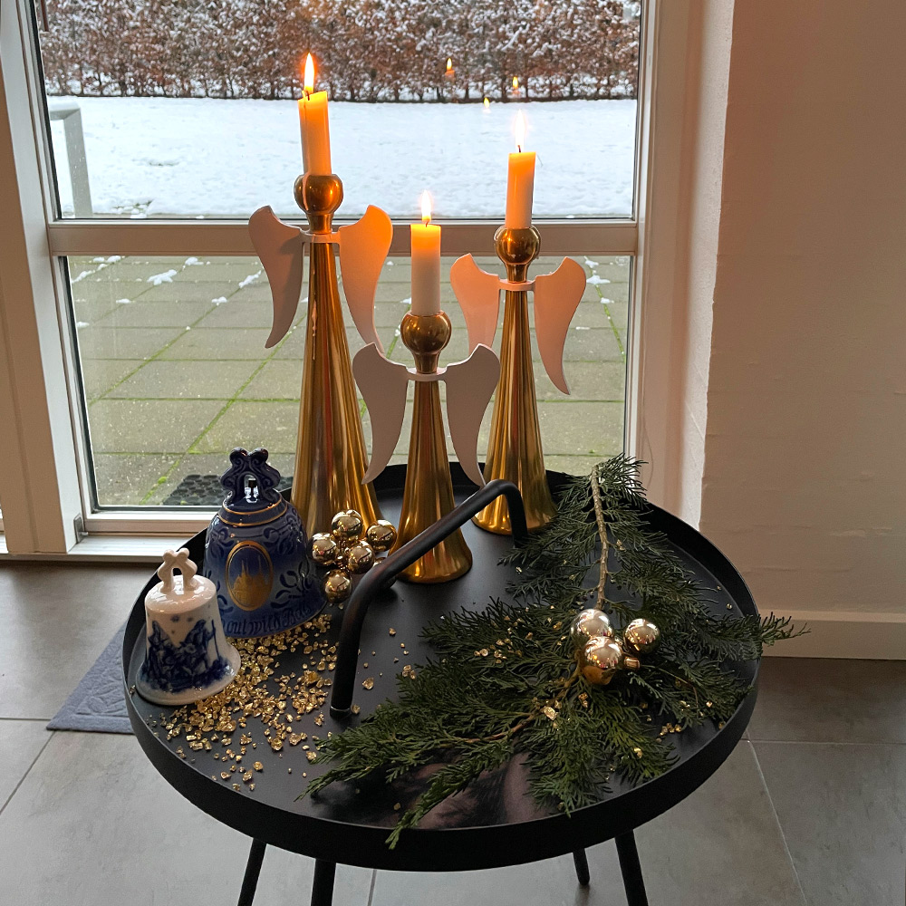 Beautiful Christmas setup with bells and candleholders