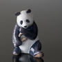 Racoon and Panda Figurines
